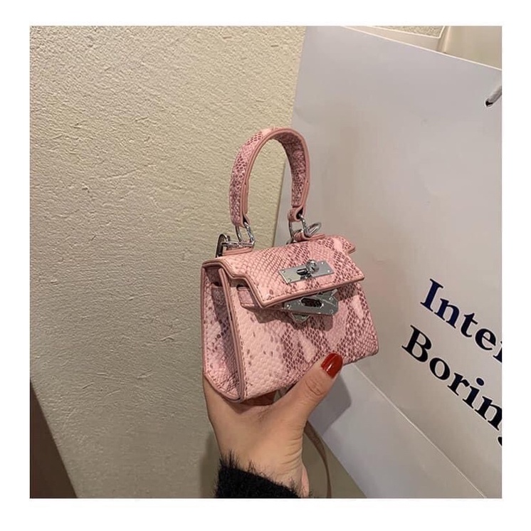 Túi xách nữ HM hồng rắn size 11cm hot 2022