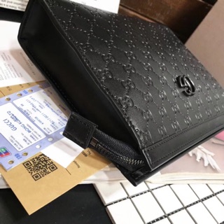 Túi cầm tay Guc'ci dập 3D