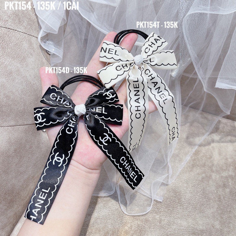 DÂY CỘT TÓC HÌNH NƠ CHỮ CHANEL