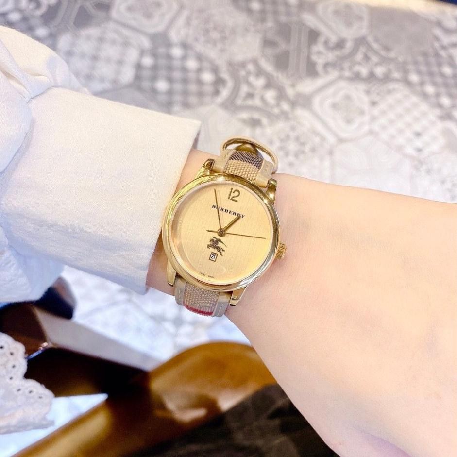Đồng hồ nữ Burberry dây da cao cáp, kẻ caro tính tế, thẻ bảo hành 12 tháng  - dong