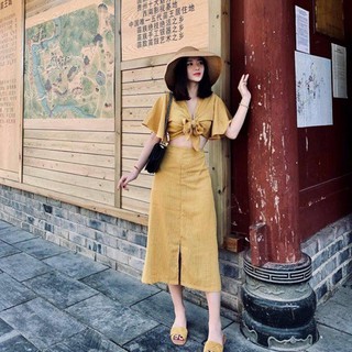 Bán sỉ set áo croptop vàng cột nơ + chân váy midi caro 20charm