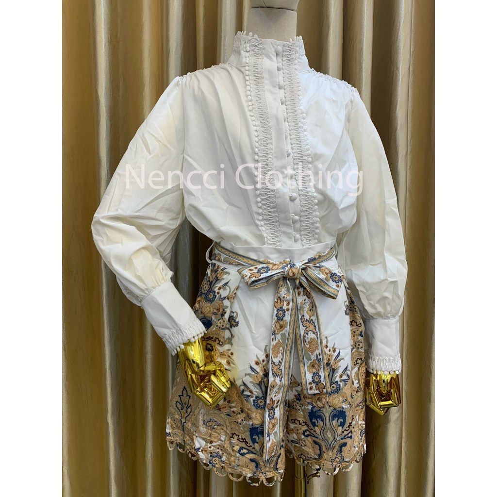 Set váy_áo sơ mi trắng cổ tròn có belt lưng mix quần đùi ngố in họa tiết hoa lá màu sắc vintage