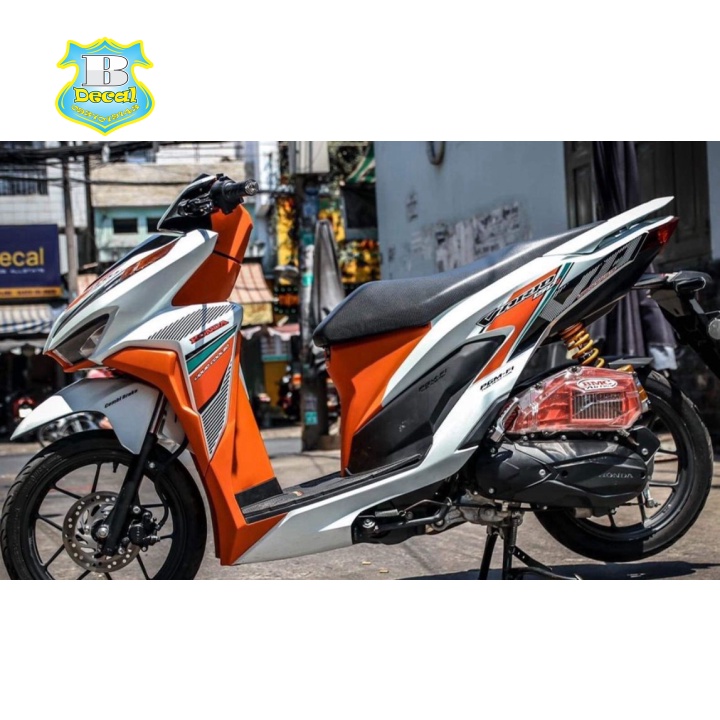 ( Quí khách vui lòng mang ra tiệm cho thợ dán ) Tem vario 150 trắng cam bình decal