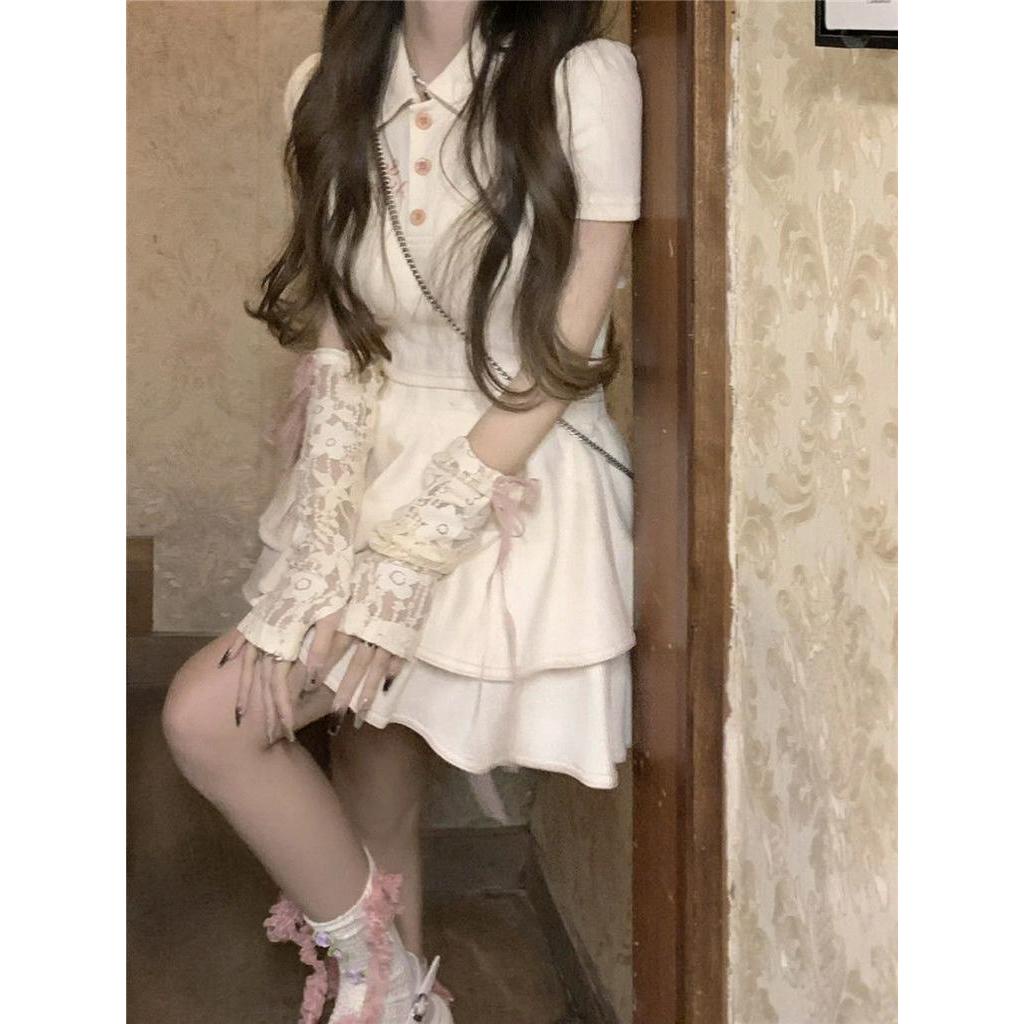 Set Áo Cổ polo + Chân Váy Ngắn Màu Hồng Đính Nơ Xinh Xắn Thời Trang