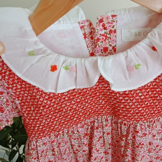 váy bé gái hoa đỏ smock