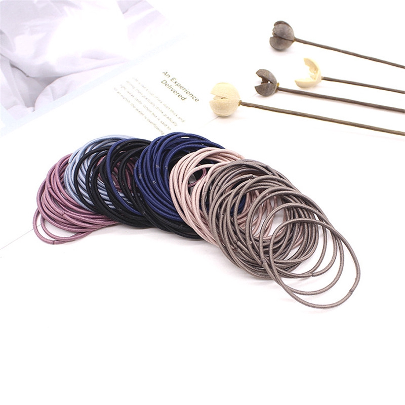 Set 50 dây buộc tóc cao su co giãn màu trơn cho nữ