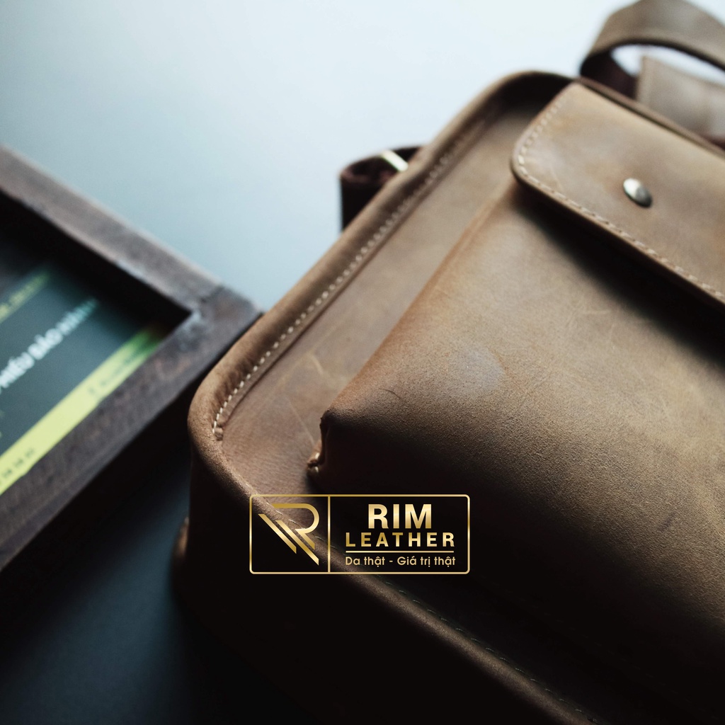 Túi đeo chéo dáng ngang. Bảo hành 2 năm