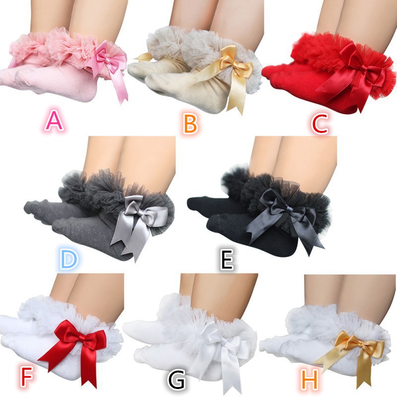 Vớ cotton cổ cao phối lông giữ ấm đính nơ xinh xắn cho bé