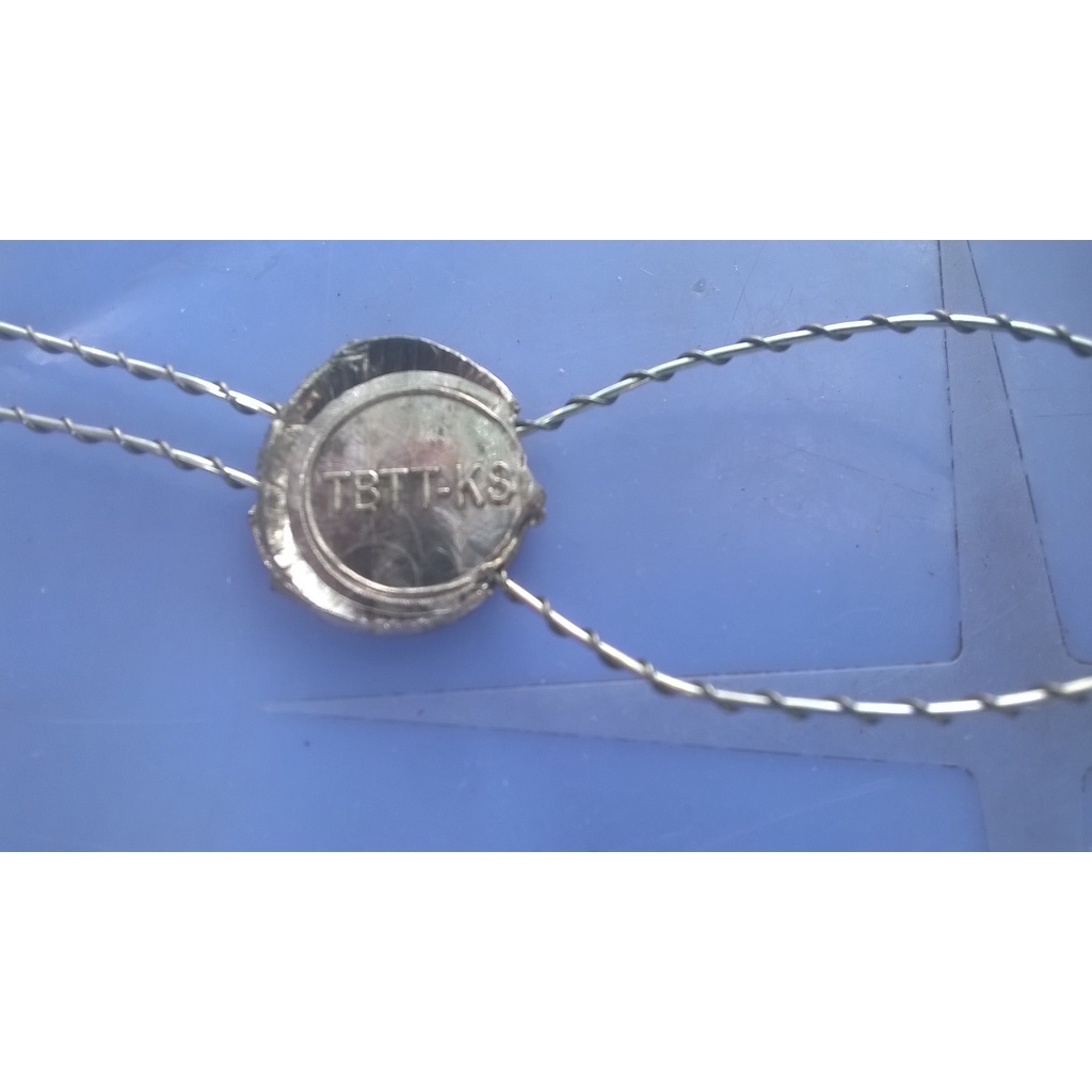 Túi chì viên 10mm  kèm 3m dây kẽm 1mm, bấm niêm phong công tơ điện, nước, hàng hóa