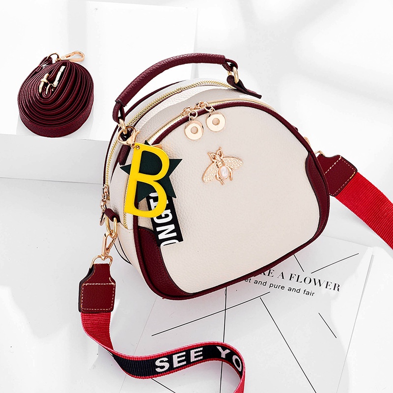 Túi Chuwanglin đeo chéo bằng da màu tương phản