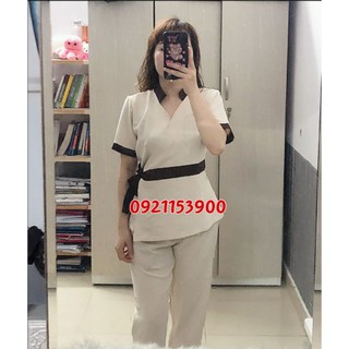 Đồng phục spa màu kem viền nâu
