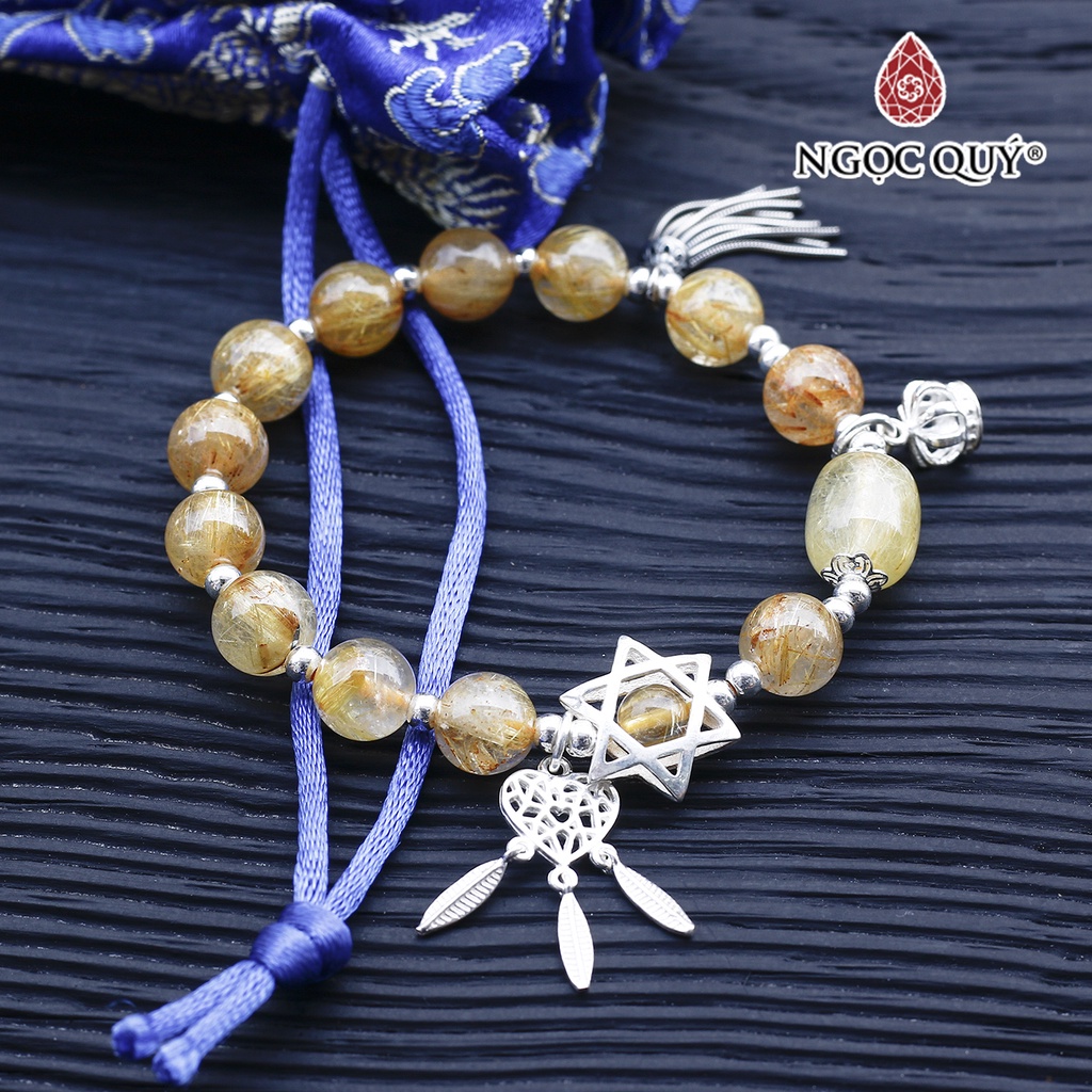 Vòng TA tóc vàng phối lu thống charm bạc - Ngọc Quý