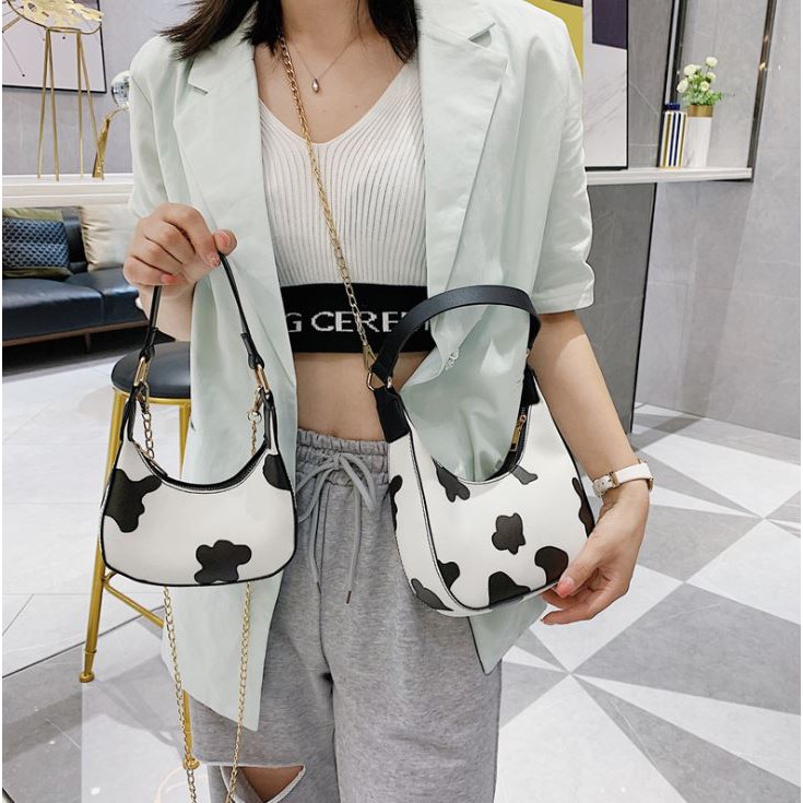 Túi da Pu họa tiết bò sữa kèm 2 dây đeo