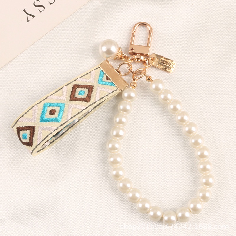 Móc khóa hình đám mây đính ngọc trai giả mới