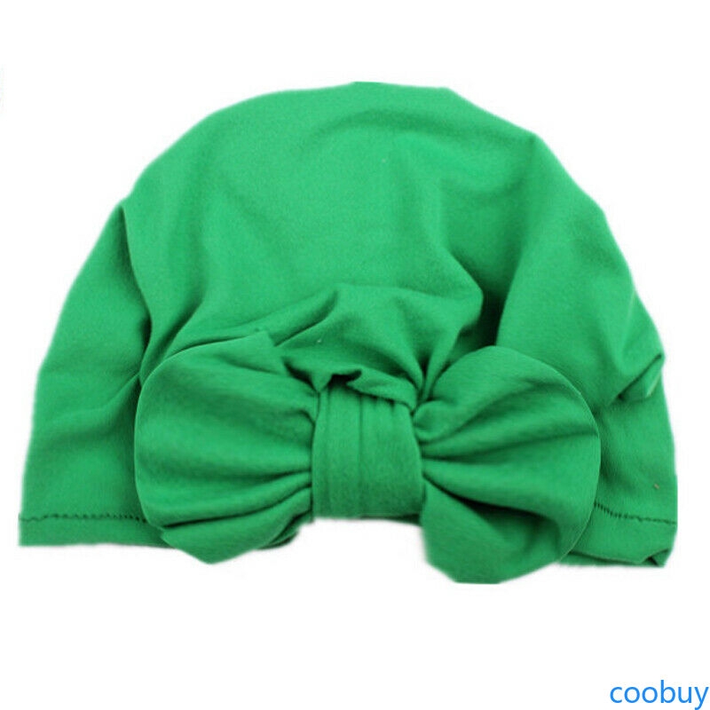 Mũ trùm đầu đính nơ đáng yêu cho bé