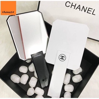 Gương soi cầm tay Chanel màu trắng