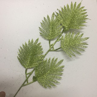 Cành lá cọ trang trí oẳn ngày tết