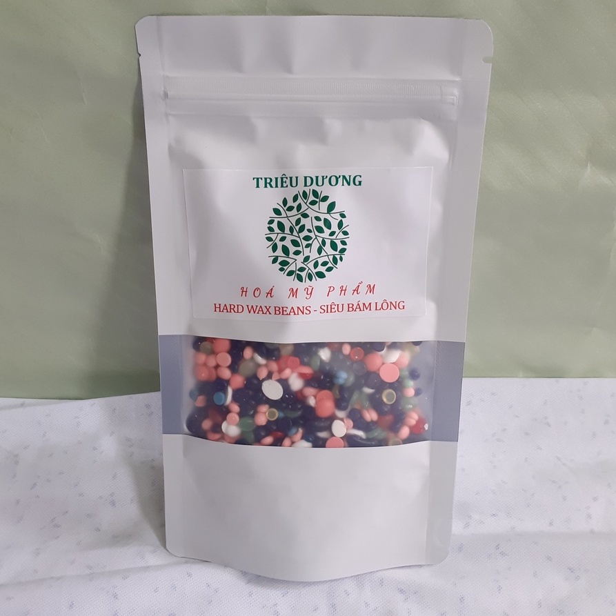 Sáp wax lông nóng hạt đậu Hard wax beans TD, bịch 100gr, bám lông và đi lông cực tốt.(Miễn phí que sáp).