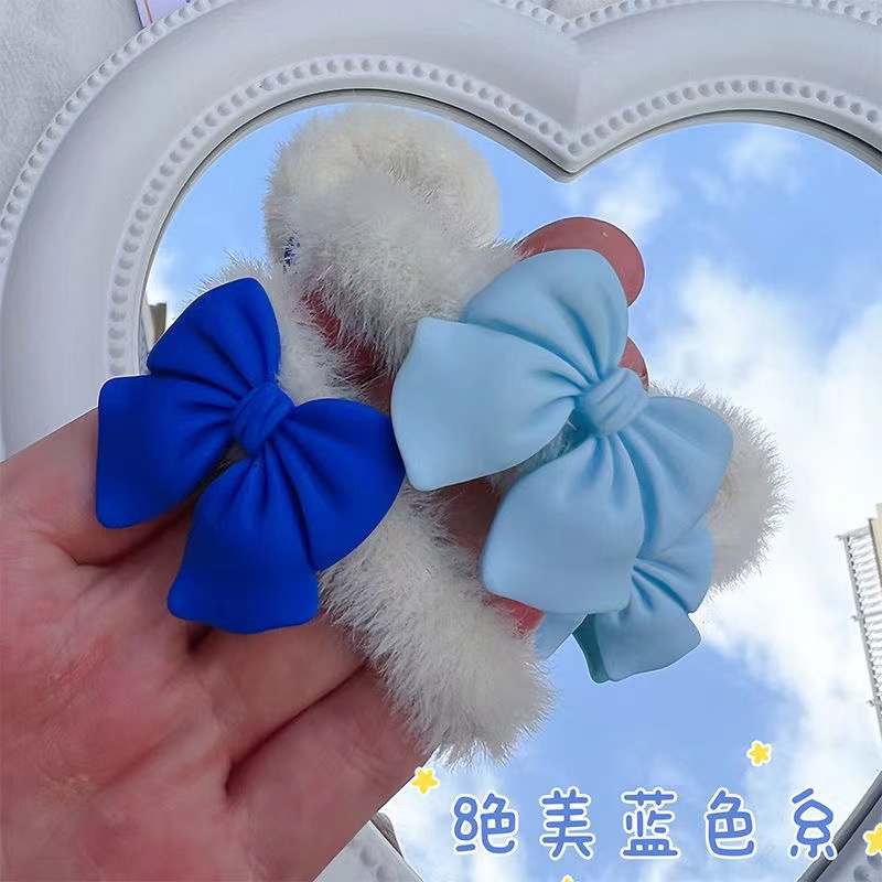 Dây buộc tóc đính nơ vải lông màu xanh dương dễ thương