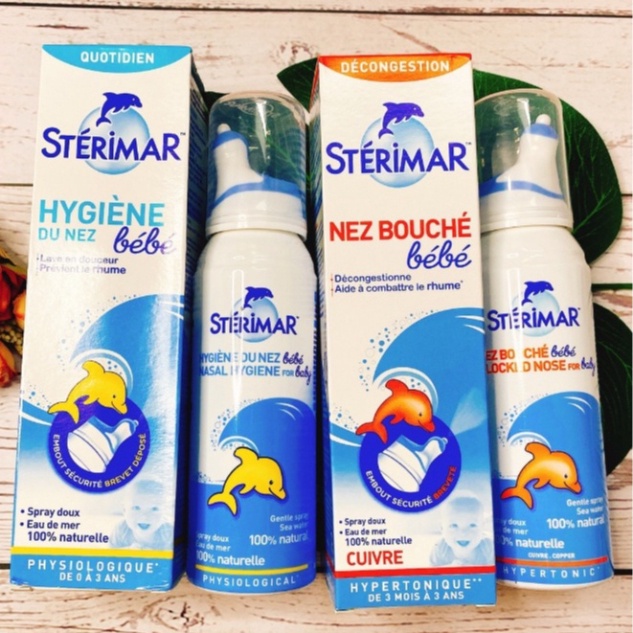 Xịt mũi muối biển cá heo Sterima màu vàng và màu cam 100ml hỗ trợ hệ hô hấp của bé luôn mạnh khoẻ