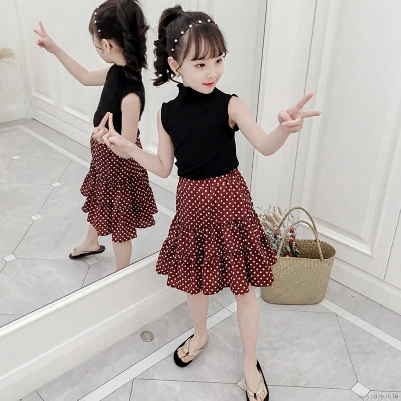 Set áo thun sát nách cổ tròn + chân váy chấm bi cho bé gái