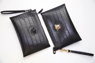 Clutch cầm tay da rắn
