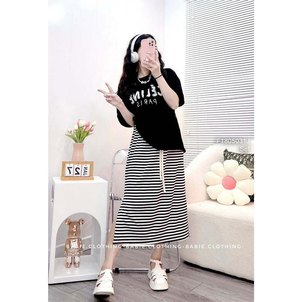 Set bộ 2 món áo thun đen in họa tiết chữ tay con kèm chân váy dáng dài kẻ sọc!