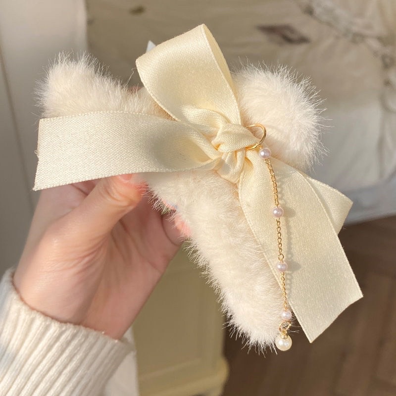 Cặp ngoạm nơ lông quả bông