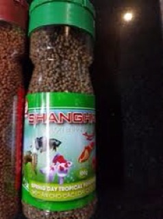 Combo 1 vợt bắt cá và 2 lọ thức ăn cá