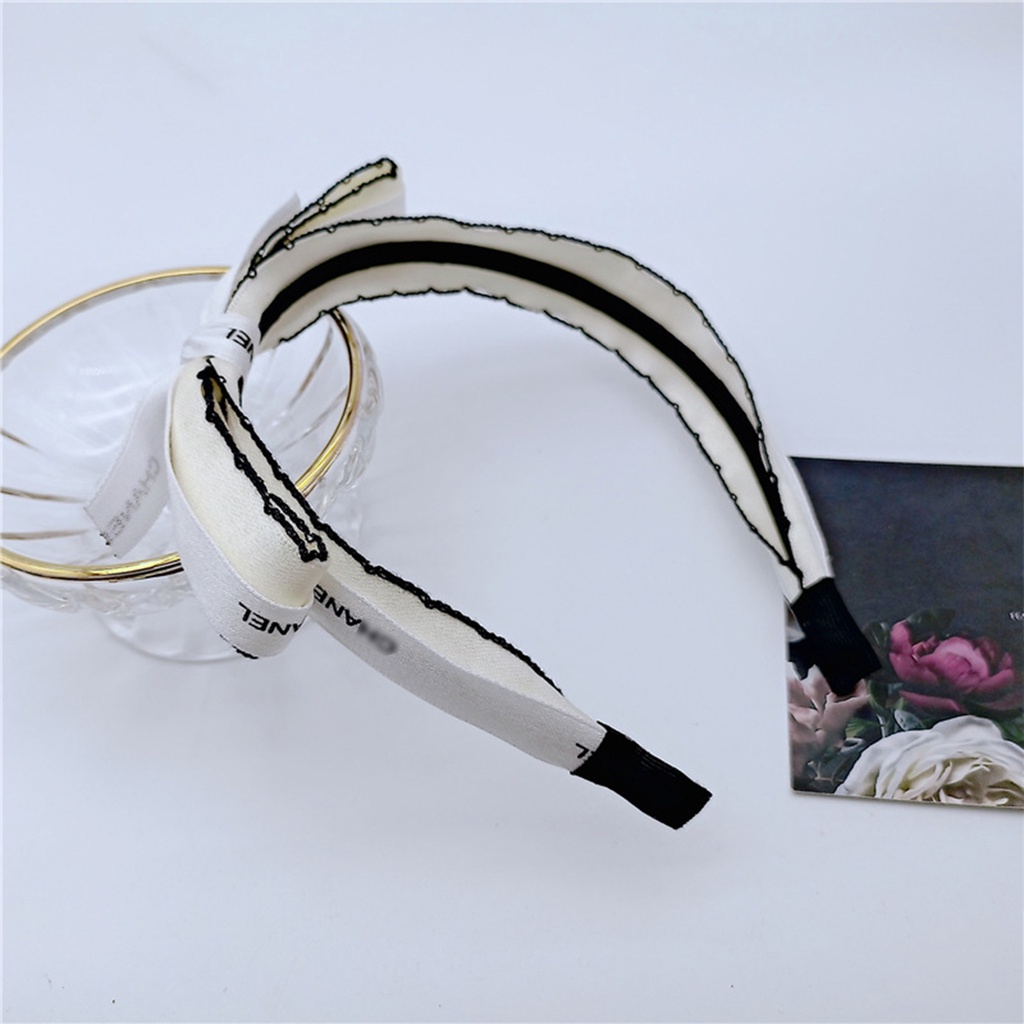 Băng đô bờm cài tóc nơ lệch vải lụa satin viền ren 2 màu đen trắng xinh xắn Hàn Quốc, June accessories