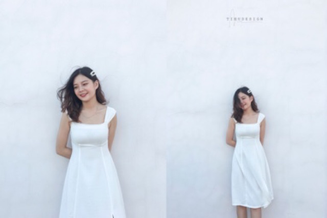 Đầm thiết kế trắng dài vai trễ, rùn ngực