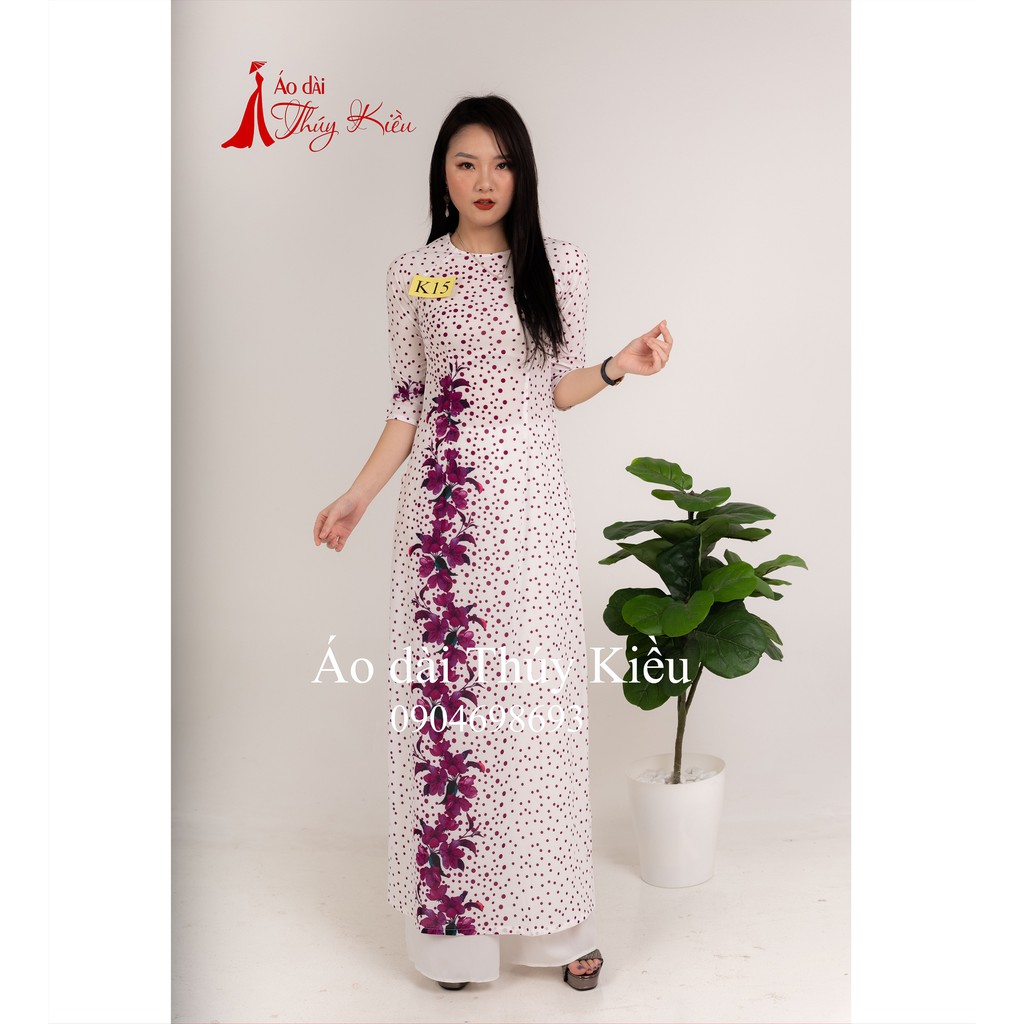 Áo dài Thúy Kiều in 3D lụa Nhật màu trắng chấm bi tím hoa dọc K15