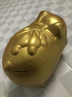 Heo đất vàng đựng tiền