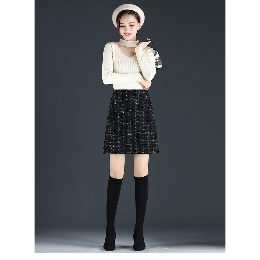 Chân váy ngắn dáng chữ A hot trend Eva design , chất vải dạ tweed màu đen kẻ sọc có quần trong siêu xinh