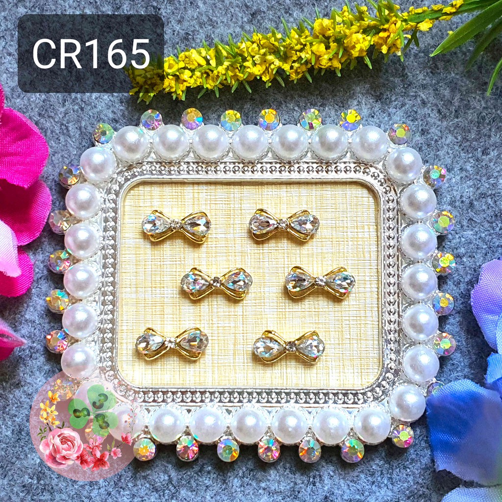 Mã CR063 - CR165 . Charm kim loại đính đá trang trí móng siêu xinh.