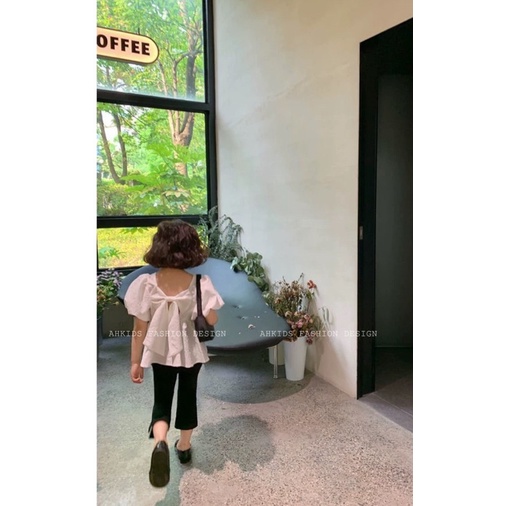 Set áo xốp trắng quần loe đen cho bé gái