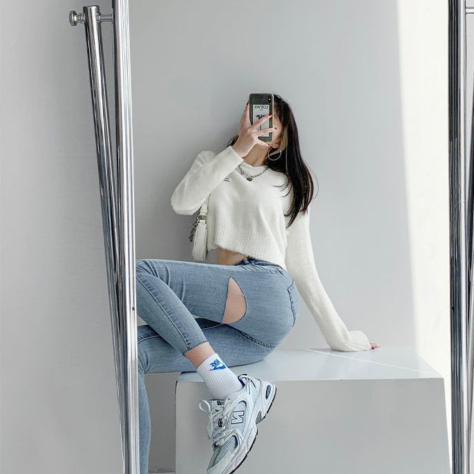Zhou Jieqiong with hole jeans women slim hip leggings 2021 spring new pencil pants