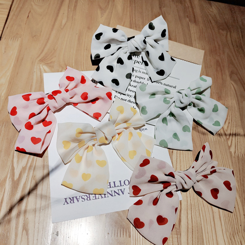 Kẹp tóc hình dáng nơ bằng vải chiffon họa tiết trái tim thời trang Hàn Quốc dễ thương cho nữ