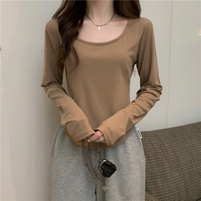 Áo thun IELGY tay dài màu trơn thiết kế bất đối xứng tạo vóc dáng gầy cho nữ
