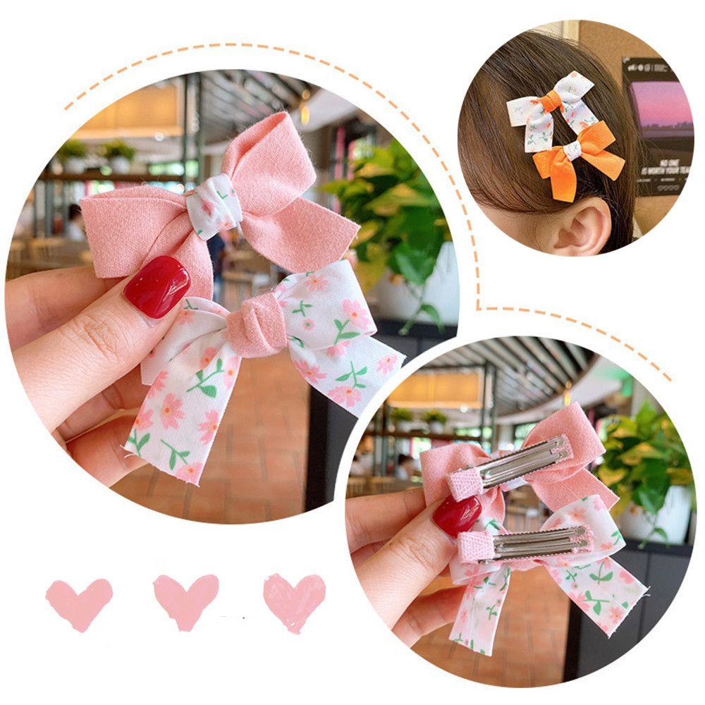 Bộ 2 Kẹp Tóc Nơ Họa Tiết Hoa Xinh Xắn Cho Bé Gái