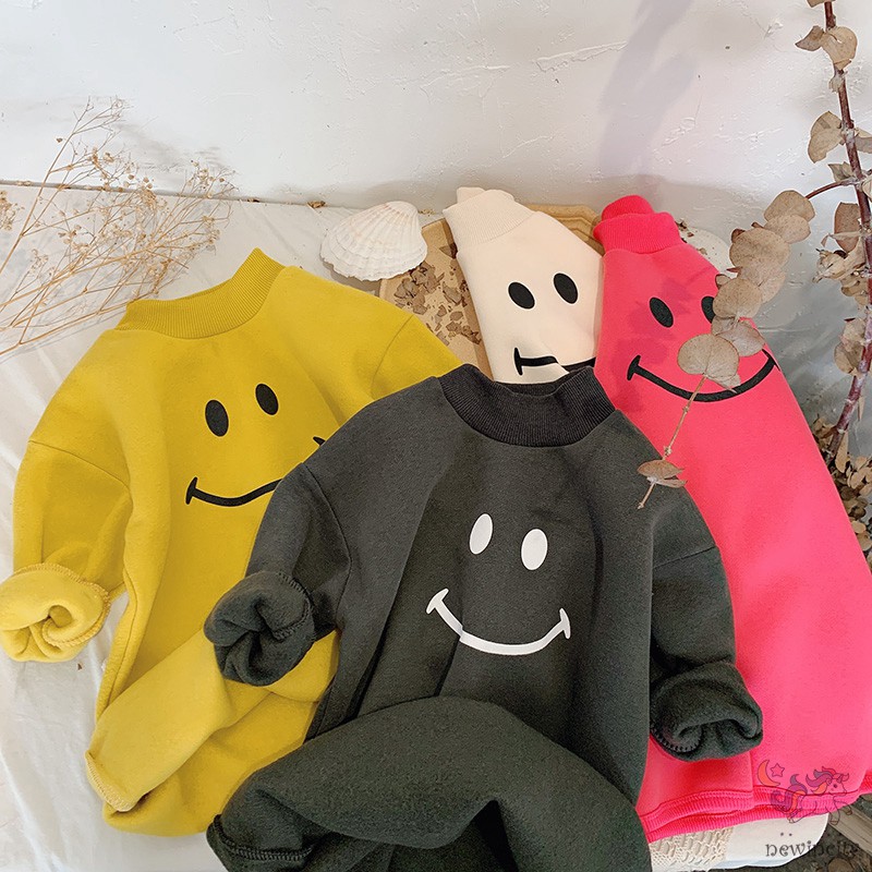 Đầm Thun Dài Tay In Họa Tiết Mặt Cười Cho Bé