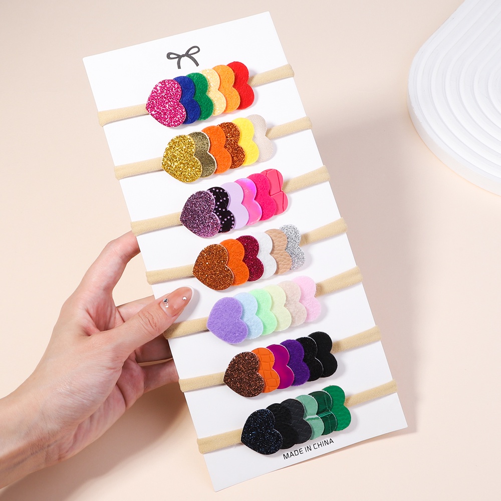 Dây buộc tóc KIDBOWS hình trái tim nhiều màu sắc bằng nylon co giãn dành cho bé gái