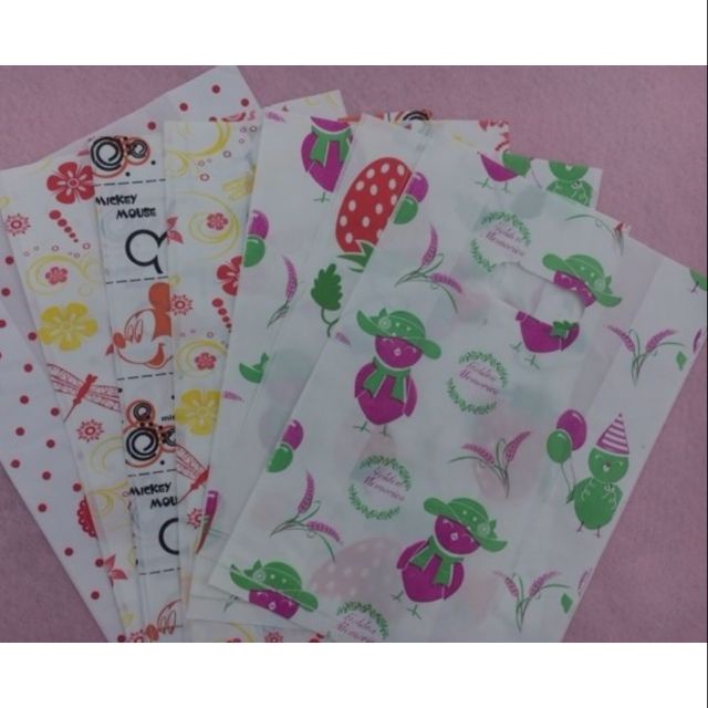 Nửa kg túi xốp bọc ni lông in hình hoa văn bao đựng quần áo hàng hóa giày dép