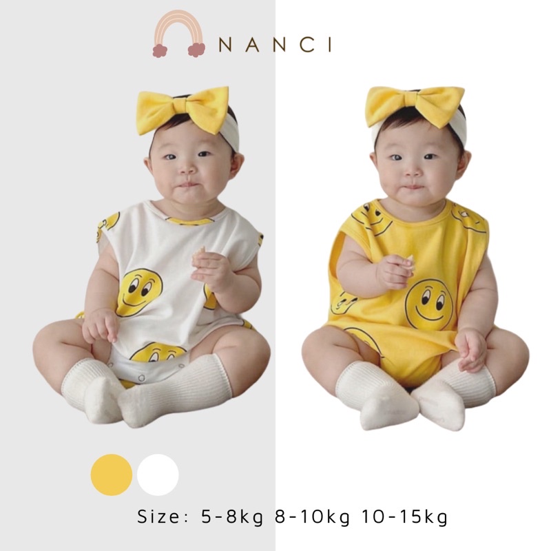 Body suit kèm nơ cánh tay mặt cười em bé