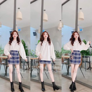 set áo sweater trắng kèm chân váy kẻ caro xanh