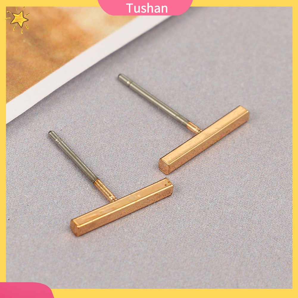 Khuyên tai hợp kim hình người tush _ dành cho cả nam và nữ