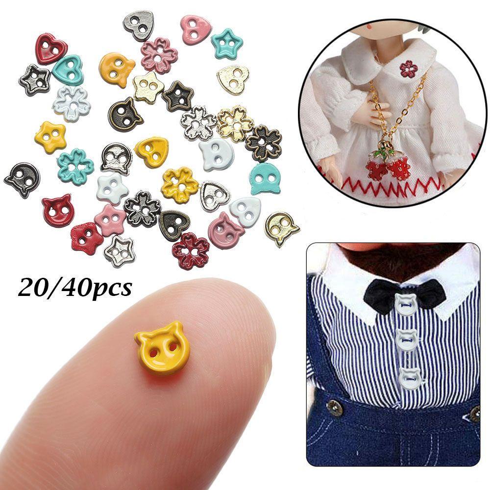 Set 20 / 40 Khóa Kim Loại 4mm Kiểu Dáng Hoạt Hình Cho Búp Bê