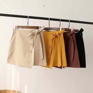 Chân váy nơ cúc xinh xắn