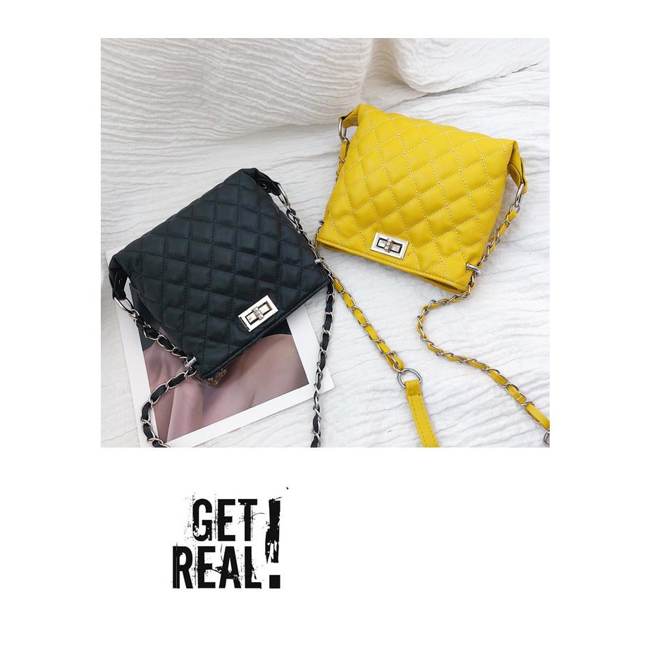 Túi xách trần trám khóa chữ thập da siêu mềm