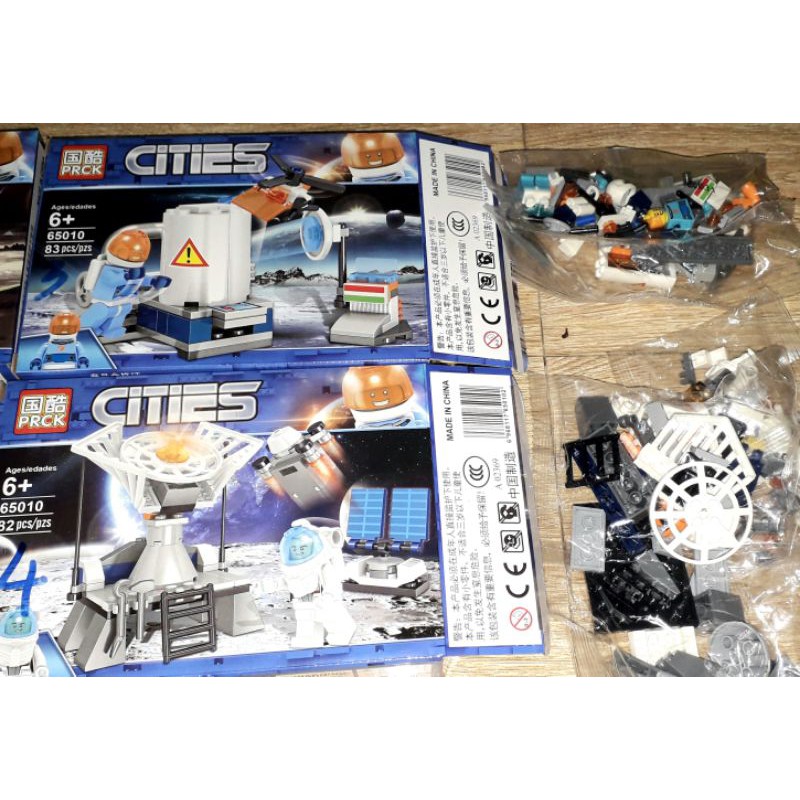 Lắp ráp 1 hộp LegoCities Phi Hành Gia vũ trụ 65010 có nhiều chi tiết bằng nhựa